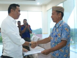 Bupati Boltim Tunjuk Idris Paputungan Plh Camat Kotabunan