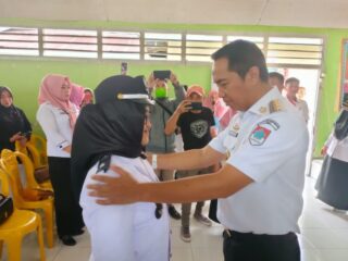 Emi Mamonto Dilantik Jadi Pjs Kepala Desa Modayag 2