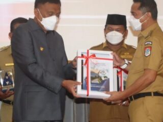 Bupati Boltim Terima Piagam Penghargaan Opini WTP ke 9