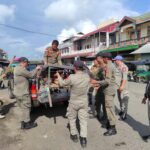 Gunakan Trotoar dan Bahu Jalan, SatPol PP Tertibkan Pedagang di Eks Pasar Serasi dan Pasar 23 Maret Kotamobagu