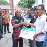Bupati dan Wakil Bupati Asahan Serahkan Bukti Kepesertaan BPJS PBI APBD