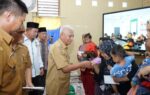 Bupati Asahan Salurkan Bantuan Makanan Tambahan kepada 50 Balita Stunting