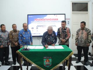 Bupati Asahan Tandatangani NPHD Pendanaan Pemilu Kepala Daerah 2024