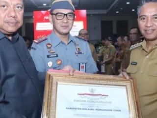 Pemkab Boltim Terima Penghargaan Kabupaten Peduli HAM