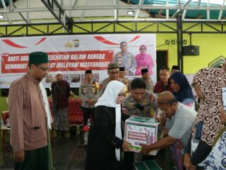 Polda Sulut Salurkan 200 Paket Sembako di Girian Permai