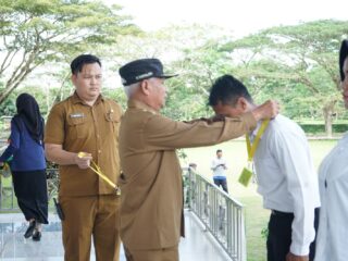 Bupati Surya Kukuhkan Satlinmas Kabupaten Asahan