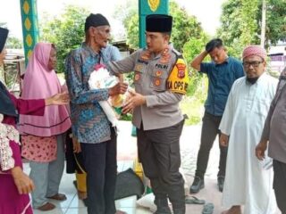 Kapolres Batu Bara Bagikan Kebahagiaan kepada Anak Yatim dan Masyarakat Kurang Mampu