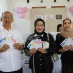 Pj Wali Kota Asripan Nani Bersama Keluarga Salurkan Hak Pilih di TPS 18 Kotobangon
