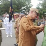 Wali Kota Asripan Nani Kukuhkan 725 Anggota Satlinmas Kota Kotamobagu