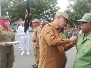 Wali Kota Asripan Nani Kukuhkan 725 Anggota Satlinmas Kota Kotamobagu