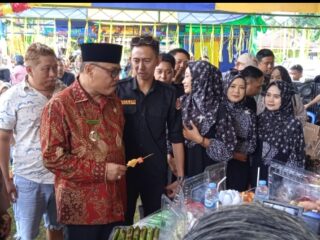 Bupati Bolmong Limi Mokodompit Hadiri Gebyar Mongulipot di Desa Mopait