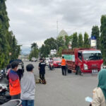 Cegah Bahaya Abu Vulkanik Gunung Ruang, BPBD Kotamobagu Bagi-bagi Masker Gratis