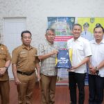 Pjs Bupati Asahan didampingi Plt Kadis Pendidikan dan Kominfo Terima Audiensi UT Medan