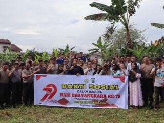 Polres Kotamobagu Gelar Bakti Sosial di TPU Mogolaing