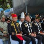Wali Kota dan Wakil Wali Kota Kotamobagu Tampil Memukau dengan Busana Adat Mongondow di HUT ke-61 Provinsi Sulut
