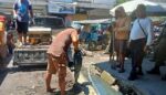 Dinas PUPR Kotamobagu Bersihkan Drainase di Jalan Kartini