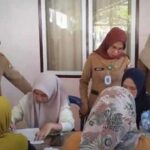 Pemkot Kotamobagu Gelar Pelayanan KB Gratis di Desa Kopandakan Satu